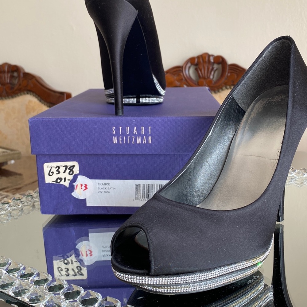 Steuart Weitzman heels size 8M in satin  color black.